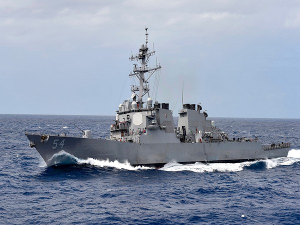 China accuses US of sabotaging regional security as American warship sails through Taiwan Strait