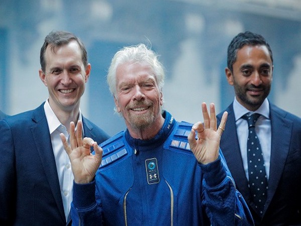 Virgin Galactic spaceship returns from space with Branson, crew