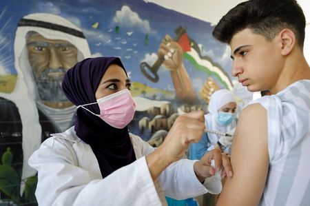 COVID vaccine mandates – and prizes – boost uptake among Palestinians