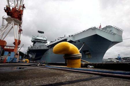 Britain shows off Queen Elizabeth aircraft carrier to anxious Japan