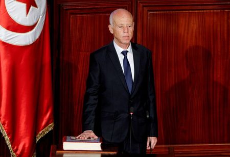 Tunisian president declares transitional rules, new electoral law
