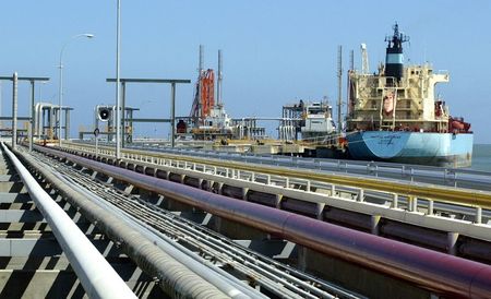 Exclusive-Under U.S. sanctions, Iran and Venezuela strike oil export deal – sources