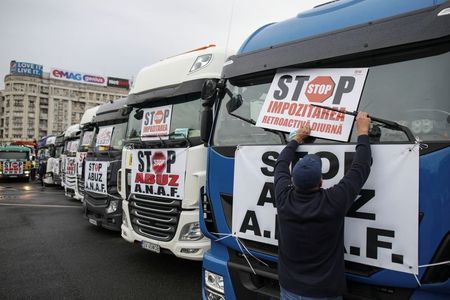 Romanian truckers, hit by taxes at home, tempted by British jobs