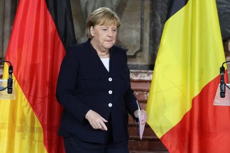 Merkel says EU must resolve Polish problem in talks, not courts