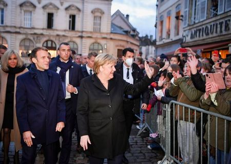 Macron in final toast to Merkel: ‘you kept Europe united’