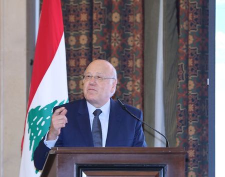 Buffeted by crises, Lebanon PM urges minister to do right thing