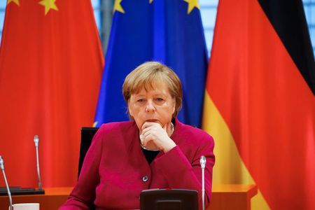 Exclusive-Germany may have been naive on China at first, Merkel says