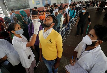 India advises states to step up COVID testing; Mumbai delays school reopening