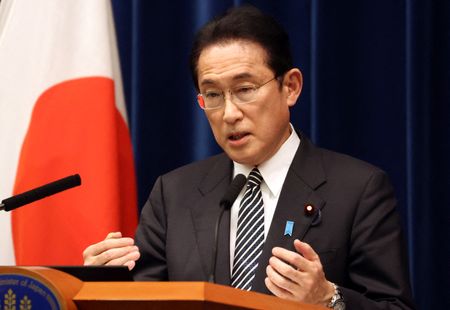 Japan to expedite booster shots, bolster island defence -PM Kishida