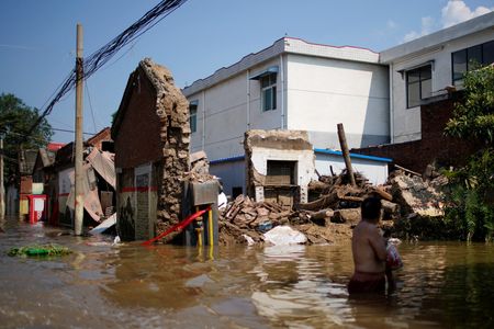 Beijing punishes local officials for handling of deadly Henan floods