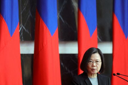 Facing Chinese pressure, Taiwan president pledges to ‘stride’ into the world