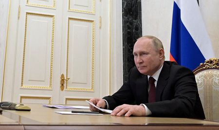 Putin says Macron told him Ukraine leadership is ready to implement Minsk peace deal