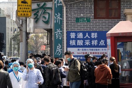 China on brink of biggest COVID-19 crisis since Wuhan as cases triple
