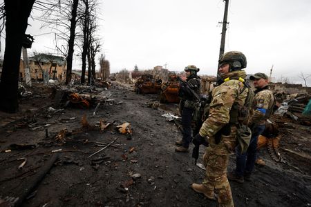 Russian retreat leaves trail of slain civilians in town near Kyiv