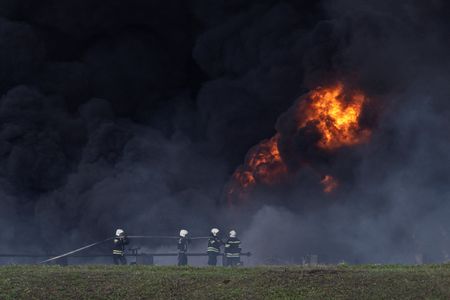 Russia investigates large oil depot fire in region near Ukraine