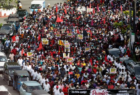 Lanka PM Mahinda Rajapaksa proposes to curb presidential powers amid anti-govt protests