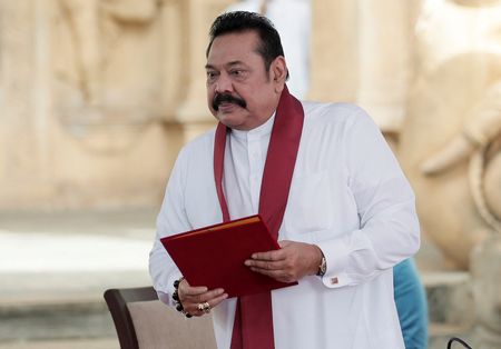 Lanka’s rights body delays summoning ex-PM Mahinda Rajapaksa over attacks on protesters