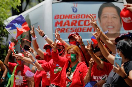 Marcos, son of strongman, triumphs in Philippines presidential election
