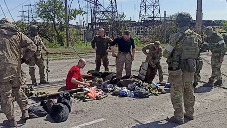 Russia says more Ukraine fighters surrender in Mariupol; U.S. reopens Kyiv embassy